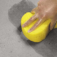 Blend area with a wet sponge.