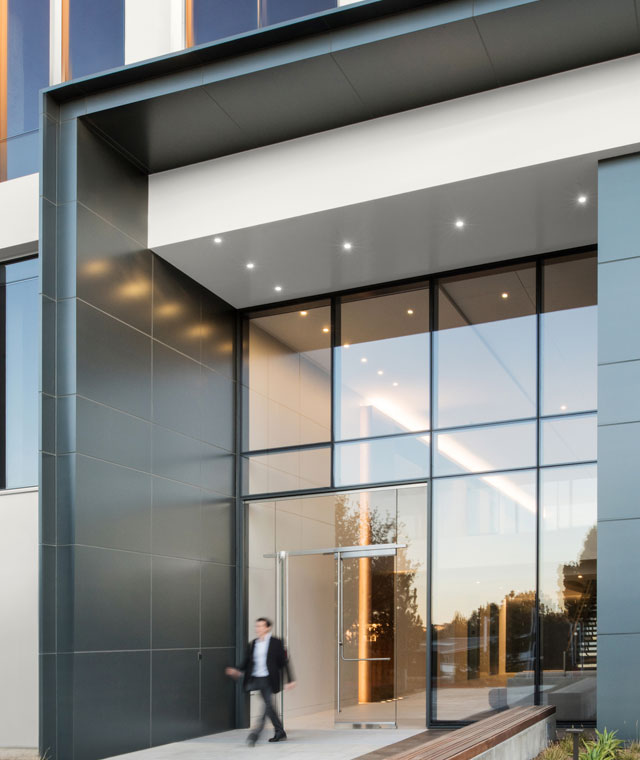An exterior office entrance with large glass windows.
                Whisper White HDC-MD-08
                