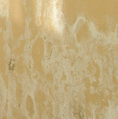 Close up image of a surface when crusty, white salt deposits, leached from mortar as water passes through it