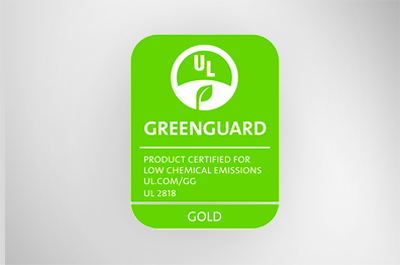 Image of  the GreenGuard Gold Logo on a gray background.