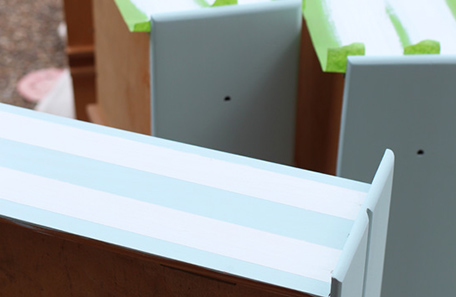 Blue drawers with painter’s tape masking for side stripes