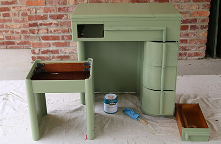 sewing desk and chair after first coat of paint