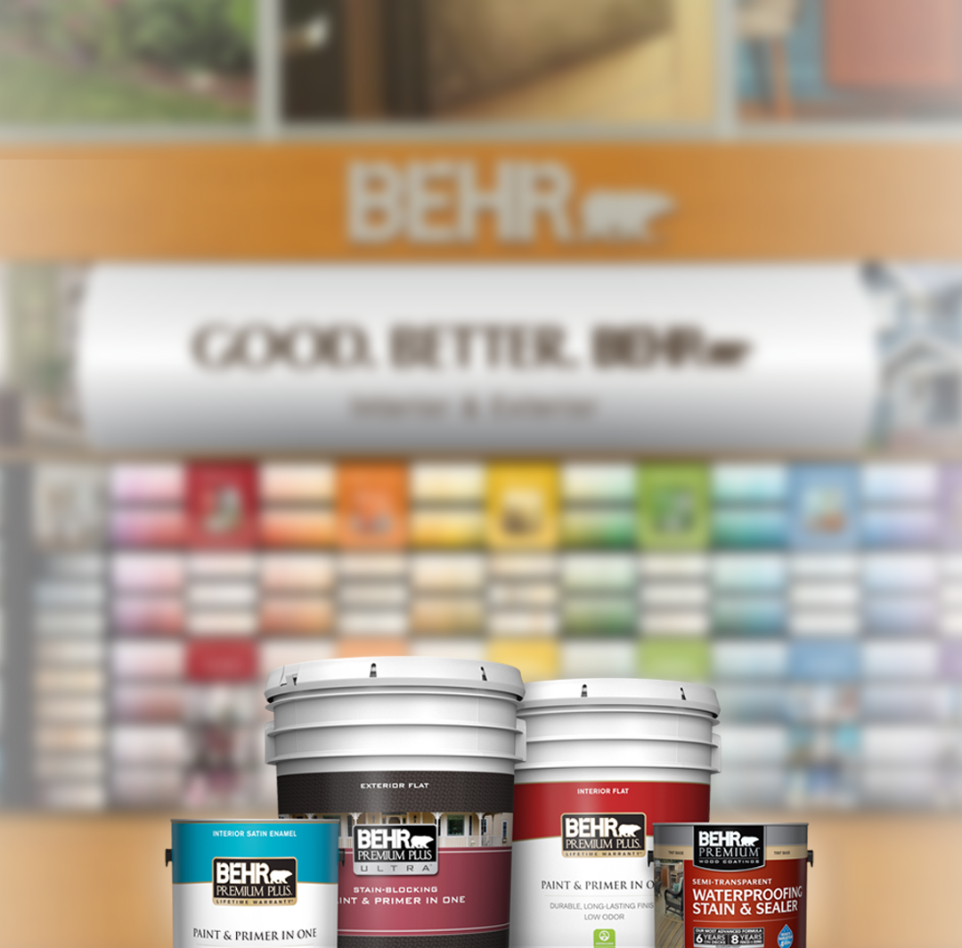 BEHR Paint  and Stain Cans in front of  the BEHR Color Center