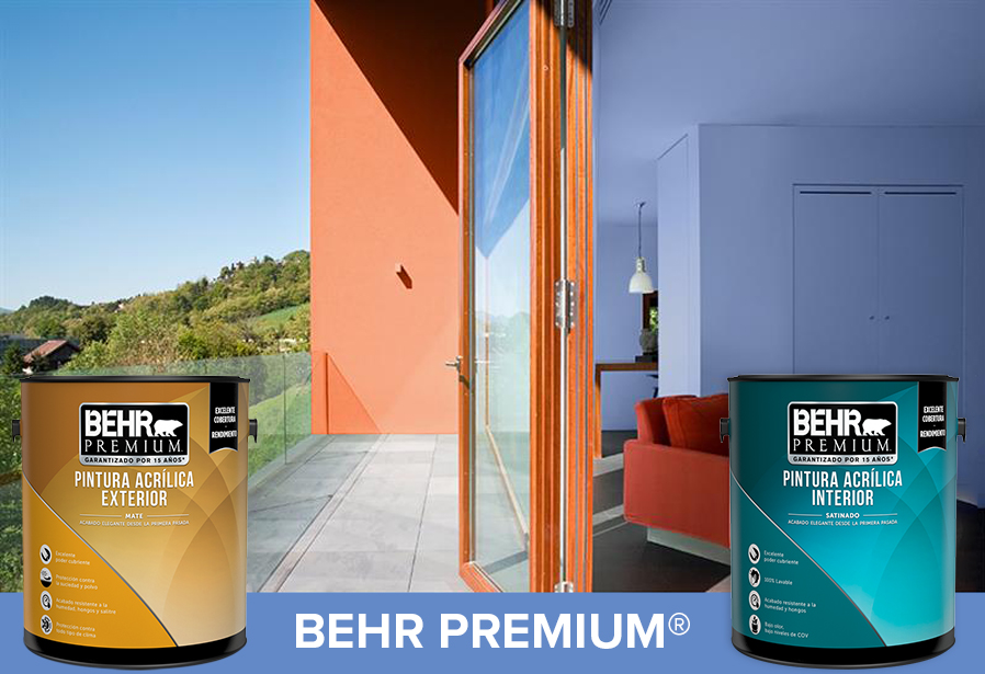 BEHR PREMIUM 1 gallon cans in front of a painted house